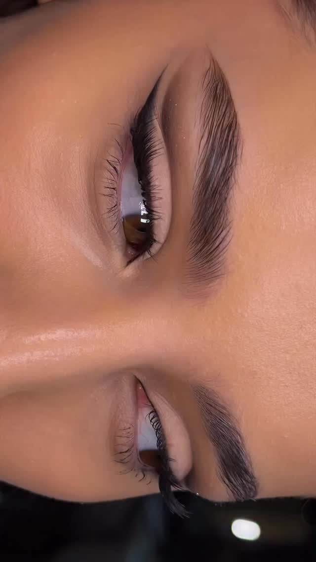 Close-up of eyes with sharp black winged eyeliner and long, defined lashes.