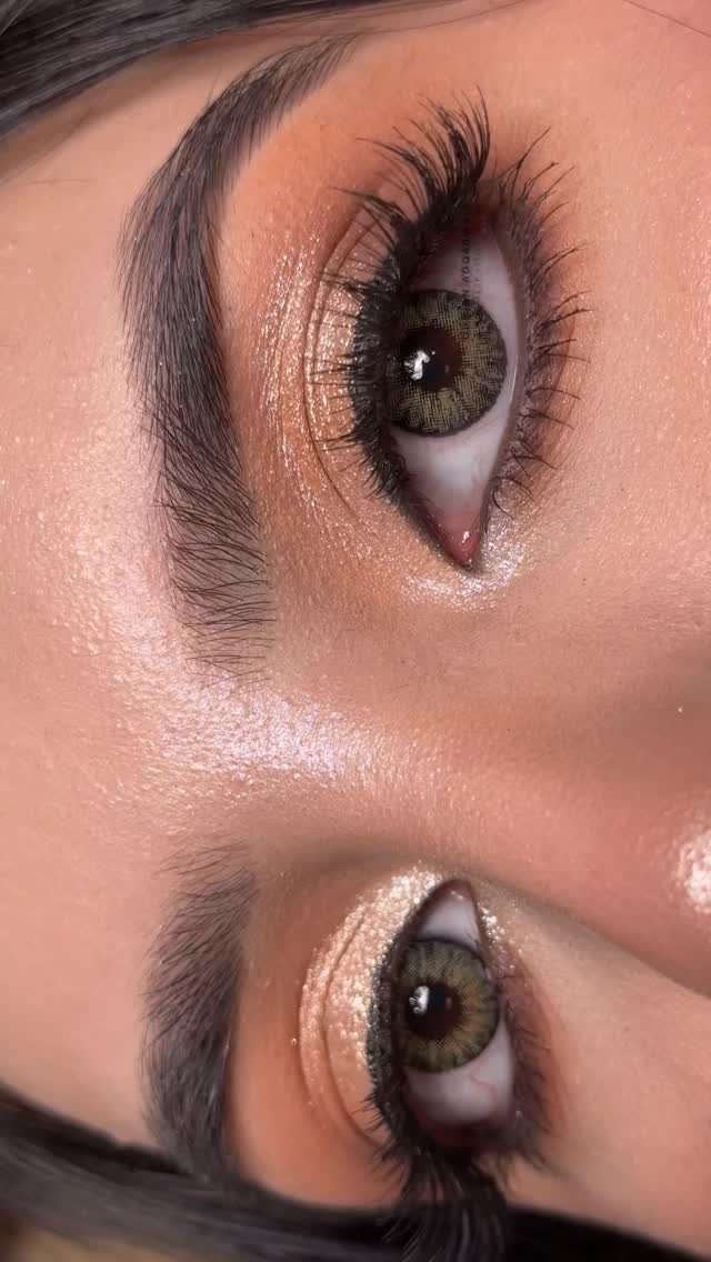 Eyes with gold shimmer eyeshadow and long lashes for a bridal look